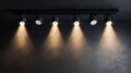 Five spotlights in a dark room: modern industrial lighting design Royalty Free Stock Photo
