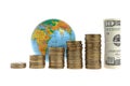 Five stacks of coins with a globe and a bundle of dollars Royalty Free Stock Photo