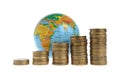Five stacks of coins with a globe Royalty Free Stock Photo