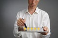 Five star rating or ranking, benchmarking concept. Man with tablet PC assesses service, hotel, restaurant Royalty Free Stock Photo