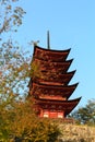 Five stories Pagoda with momiji maple tree Royalty Free Stock Photo