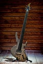 Five-string electric dark wood bass. Background for music and creativity Royalty Free Stock Photo