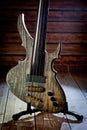 Five-string electric dark wood bass. Background for music and creativity