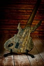 Five-string electric dark wood bass. Background for music and creativity