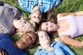 Five students relaxing outside