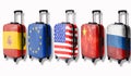 Five suitcases with flags of such countries depicted on them: Russia, China, America, European Union, Spain. Isolate Royalty Free Stock Photo