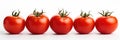 Five Tomatoes Lined Up In A Row On A White Background