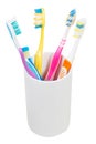 Five tooth brushes in ceramic glass Royalty Free Stock Photo