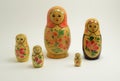 Five traditional Russian nesting dolls on white Royalty Free Stock Photo