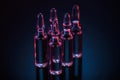 Five transparent glass ampoules with substance