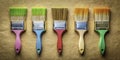 Five Versatile Renovation Brushes on Textured Craft Paper A DIY Artists Toolkit for Home Improvement Creative Projects Royalty Free Stock Photo