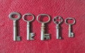 Five very small Antique pipe Keys Royalty Free Stock Photo