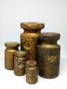 five weights made of brass Royalty Free Stock Photo