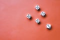 Five white dice on an orange background. Combination: square on fives