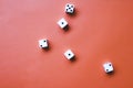 Five white dice on an orange background. Combination: two pairs on units and deuces Royalty Free Stock Photo