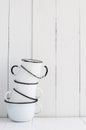 Five white enameled mugs Royalty Free Stock Photo