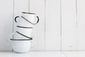 Five white enameled mugs Royalty Free Stock Photo