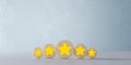 five wooden circle with yellow star on blue. evaluation, increase rating, customer experience, satisfaction and services rating.