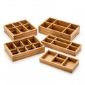Five wooden organizer boxes feature various compartments and sizes Royalty Free Stock Photo