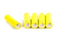 Five yellow alkaline batteries Royalty Free Stock Photo