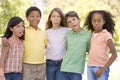 Five young friends outdoors making funny faces Royalty Free Stock Photo