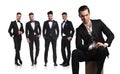 Five young men in tuxedoes with leader sitting in front Royalty Free Stock Photo