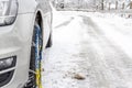 Fix snow chains on car Royalty Free Stock Photo