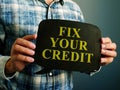 Fix your credit debt words on the quote bulb.