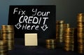 Fix your credit here handwritten sign and money