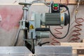 Fixed circular buzz saw with electric motor