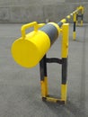 Yellow and black Roadblock Road Barrier perspective view. Metal security barrier. Fixed gate barrier. Beaconing and signaling
