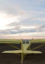 A fixed wing plane awaiting its first flight of the day