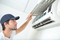 Fixing and maintaining air conditioning system Royalty Free Stock Photo