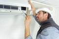 Fixing and maintaining air conditioning system Royalty Free Stock Photo