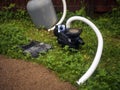 Fixing  outdoor water pump and filter Royalty Free Stock Photo