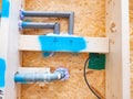 Fixing of  potable water distribution pipes with flexible mounting foam Royalty Free Stock Photo