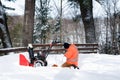 Fixing a snow blower Royalty Free Stock Photo