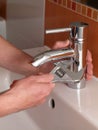 Fixing water tap Royalty Free Stock Photo