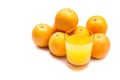 Fizzy orange juice from effervescent tablet with oranges at backdrop, flushed right Royalty Free Stock Photo
