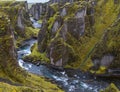 FjaÃÂ°rÃÂ¡ river flowing through beautiful Fjadrargljufur canyon. Southern Iceland. Autumn overcast day Royalty Free Stock Photo