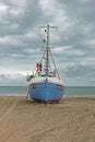 Fjerritslev, Jutland, Denmark - 11 September 2020: Fishing boat on the sandy beach of Thorup Strand