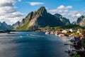 High rock on the coast of the fjord near the town of Reine, Lofoten, Norway. Royalty Free Stock Photo