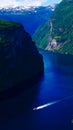 Fjord Geirangerfjord with ferry boat, Norway Royalty Free Stock Photo