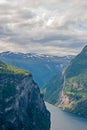 Fjord and mountains and dark sky in Norway Royalty Free Stock Photo