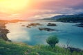 Fjord at sunset. Rocky shore of the mountain lake Royalty Free Stock Photo