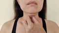 The Flabbiness adipose sagging skin under the neck, wrinkles and flabby skin under the chin, neck wattle of the woman. Royalty Free Stock Photo