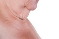 Flabby skin on the neck of an elderly woman isolated on white background Royalty Free Stock Photo