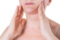 Flabby skin on the neck of an elderly woman isolated on white background