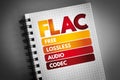 FLAC - Free Lossless Audio Codec acronym on notepad, technology concept background Royalty Free Stock Photo