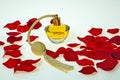 Flacon of perfume in red petals of roses Royalty Free Stock Photo